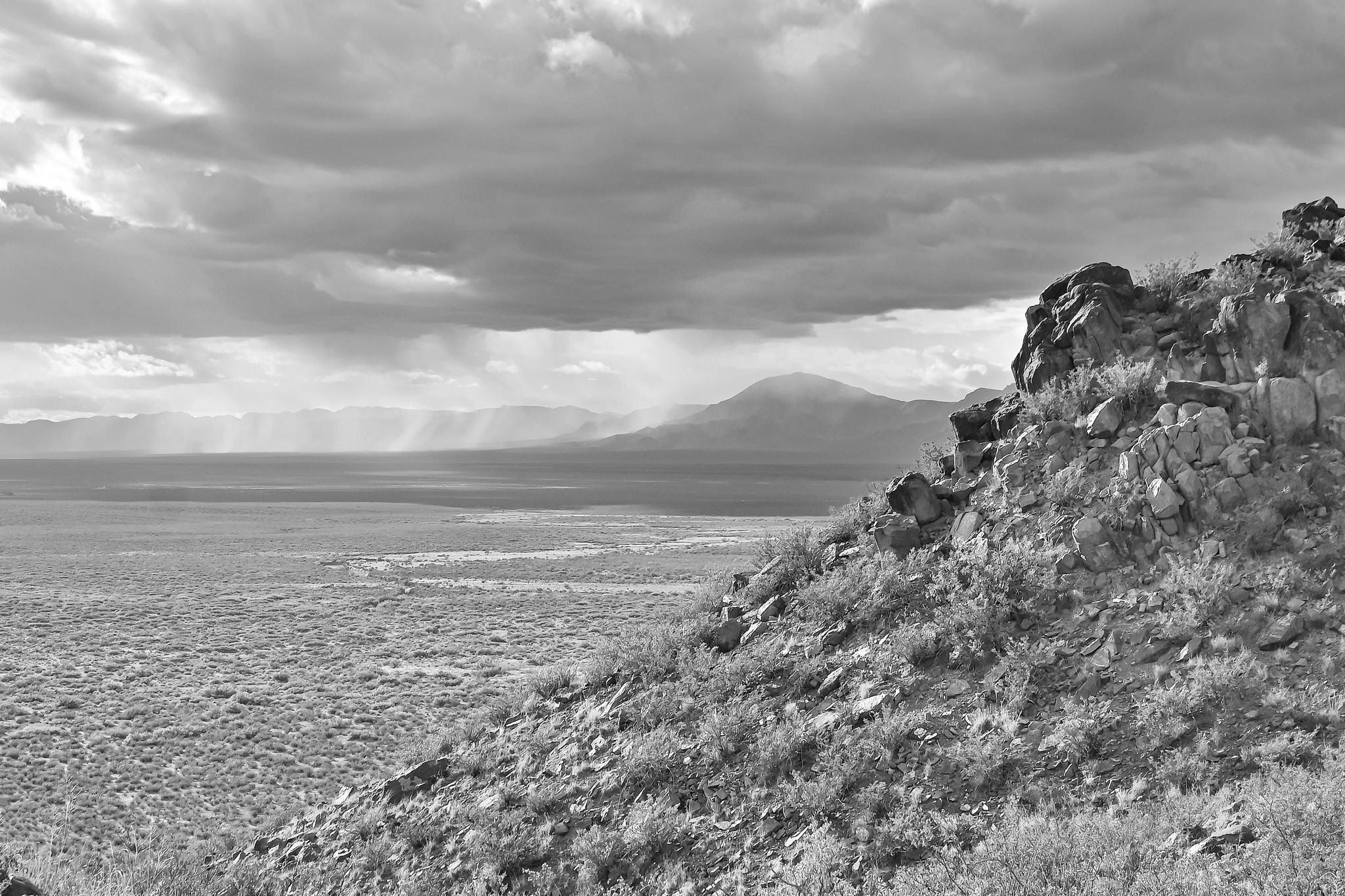 View from an outcrop across Tularosa Basin with distant mountains, New Mexico